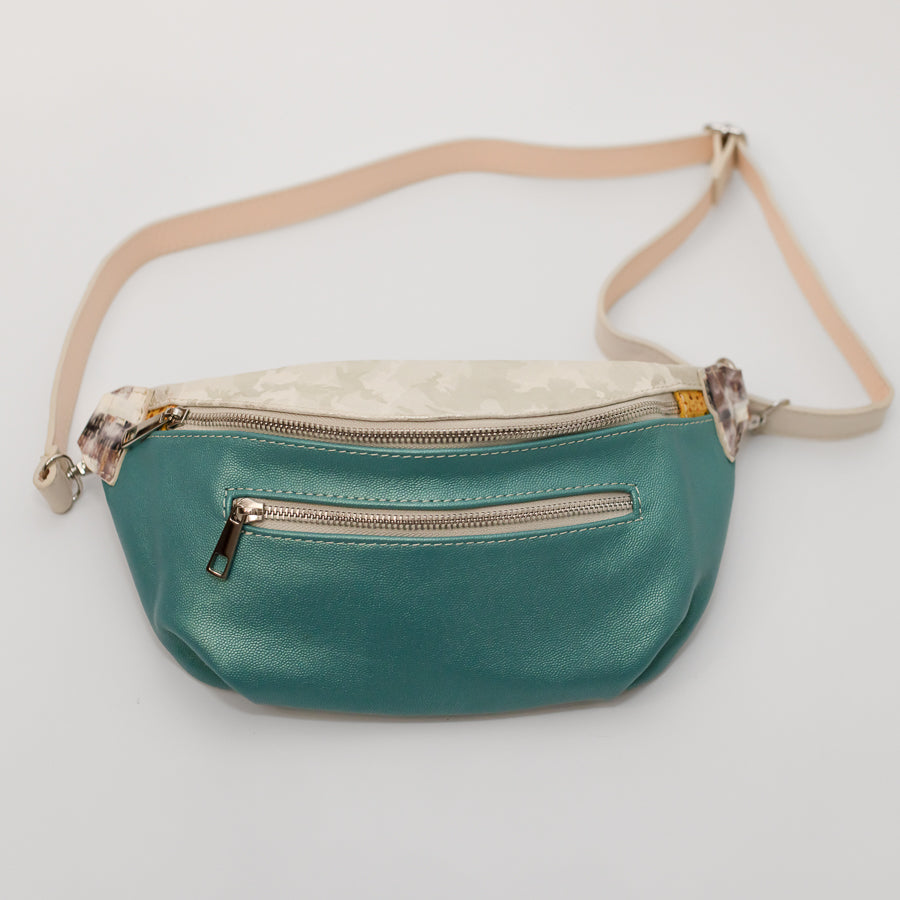 Full view of Ava crossbody bag in Laguna featuring adjustable strap and silver hardware