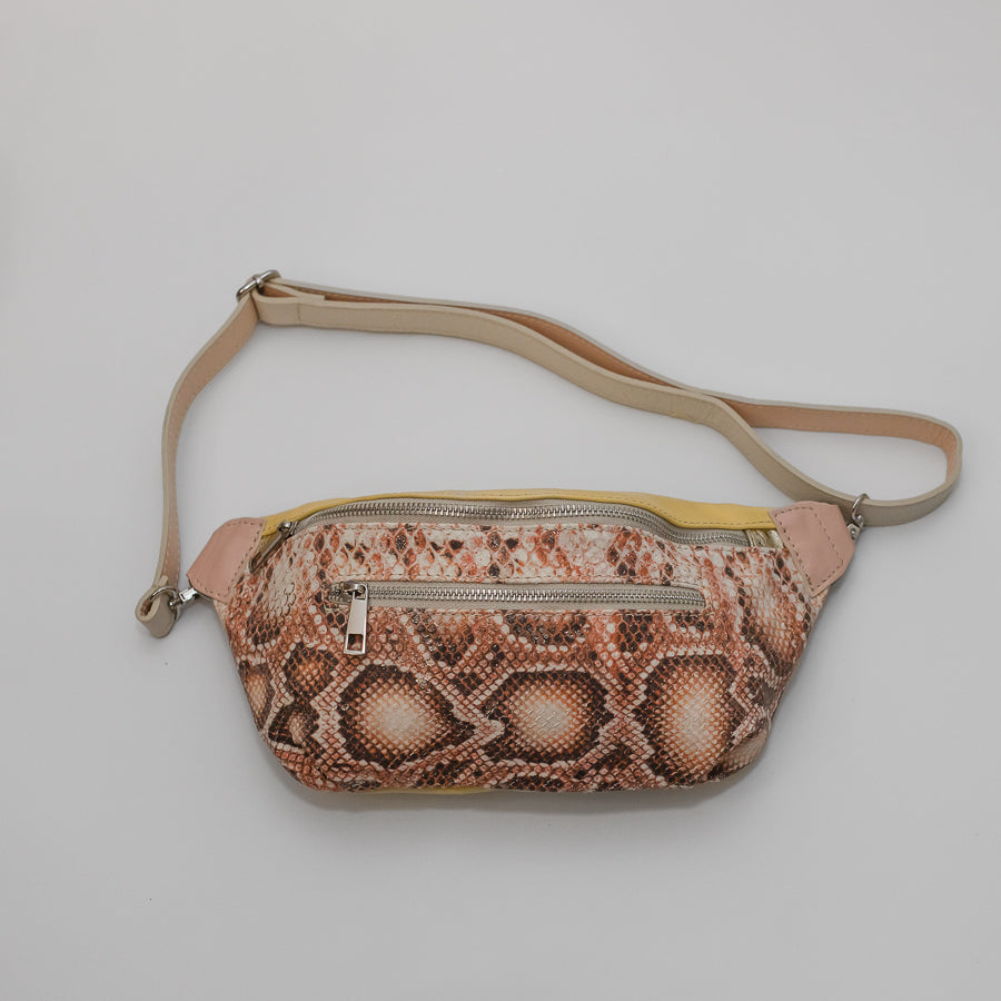 Full image of Ava crossbody bag in Tuscan Honey featuring snakeskin Italian leather and adjustable leather strap