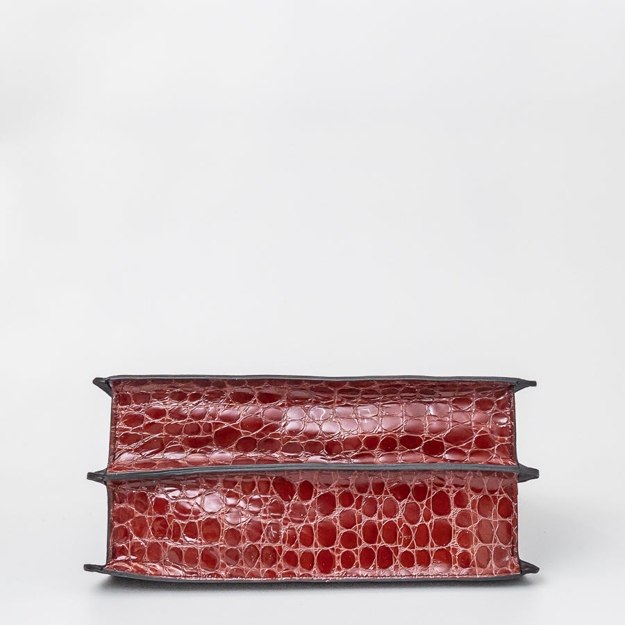 Bottom image of Charlotte handbag in Belissima featuring textured red Italian leather