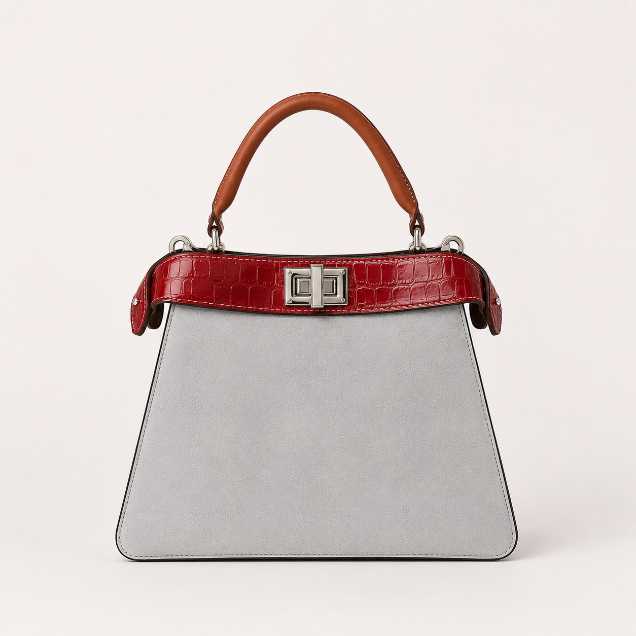 Charlotte handbag in Neve Rossa featuring textured white Italian leather with a printed red accent trim and a turn-lock clasp