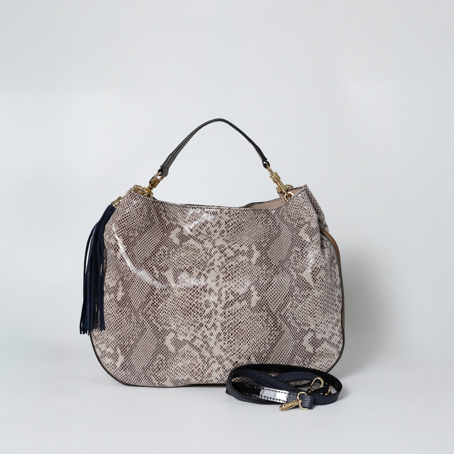 Lily handbag in Saint Tropez handcrafted in Italy featuring iridescent Italian leather and tassel detail