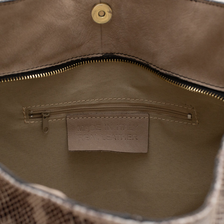 Interior image of Lily handbag Saint Tropez featuring gold snap and small interior zipped pocket