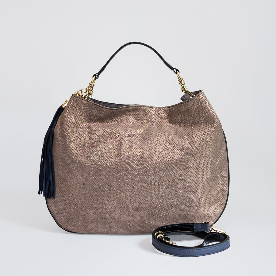 Lily handbag in Golden Hour handcrafted in Italy featuring iridescent Italian leather and tassel detail