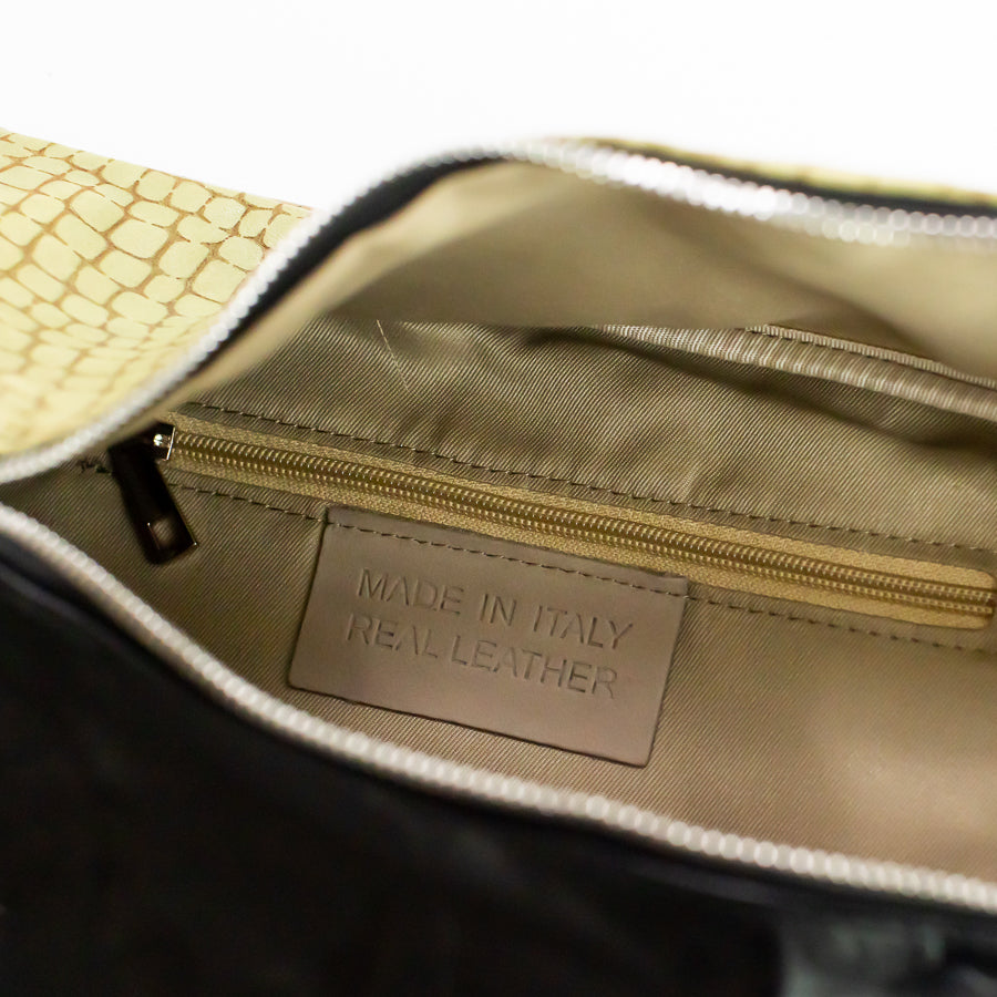 Interior view of Madeline crossbody bag Verde Notee featuring interior zipped pocket and made in Italy real leather tag
