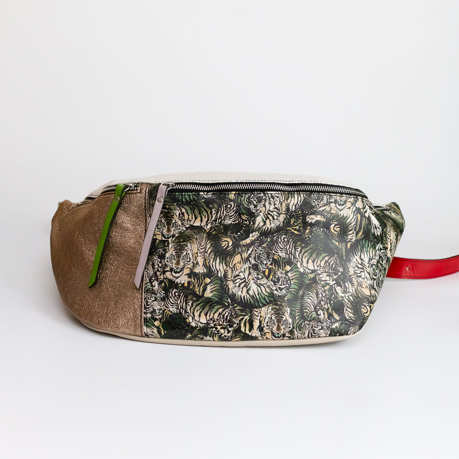Standing view of Madeline crossbody bag in Midnight Bazaar featuring the tiger printed Italian leather and both zippered compartments