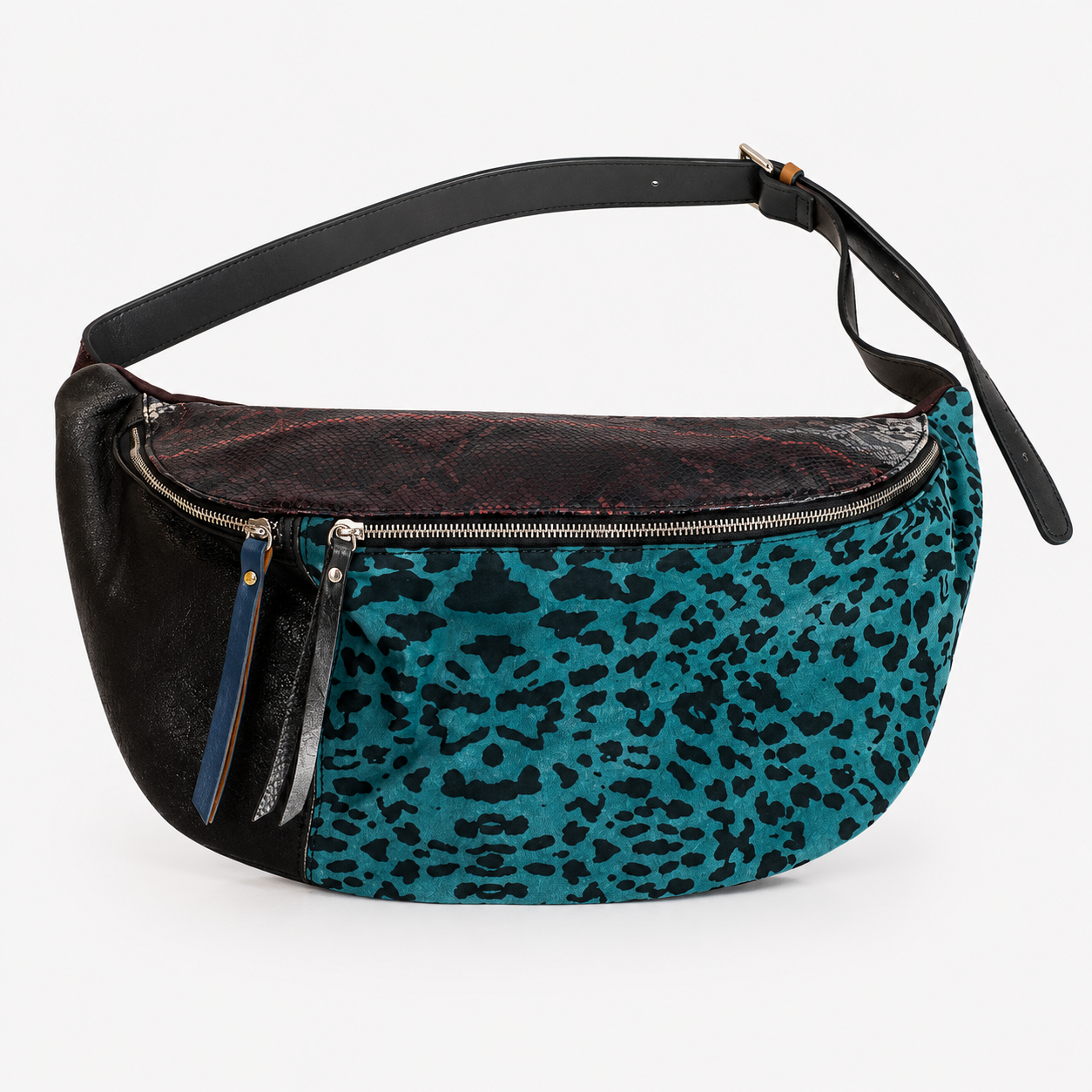 Madeline crossbody bag in Laguna Felina featuring teal leopard printed Italian leather and two zippered compartments