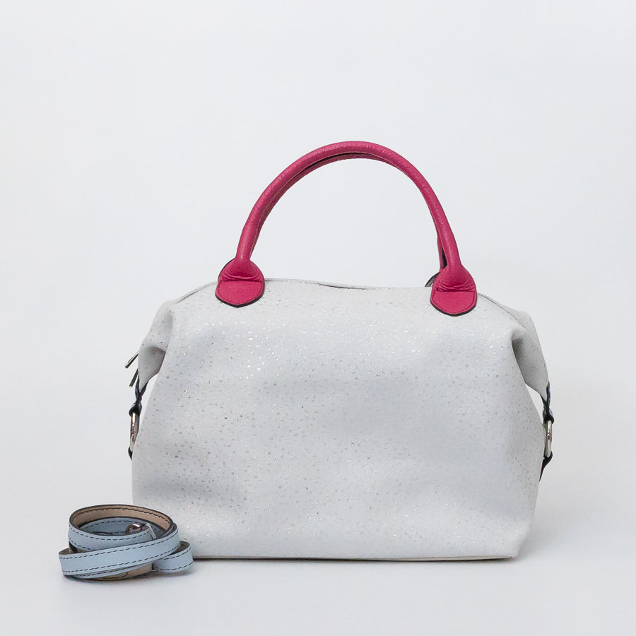 Vera handbag in Winter Orchid featuring side straps with silver o-ring clasp and structured top handles and extra strap