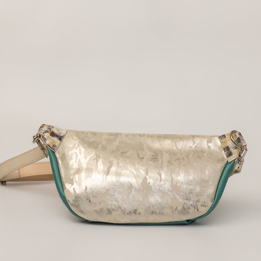 Back image of Ava crossbody bag in Laguna featuring iridescent white camouflage Italian leather