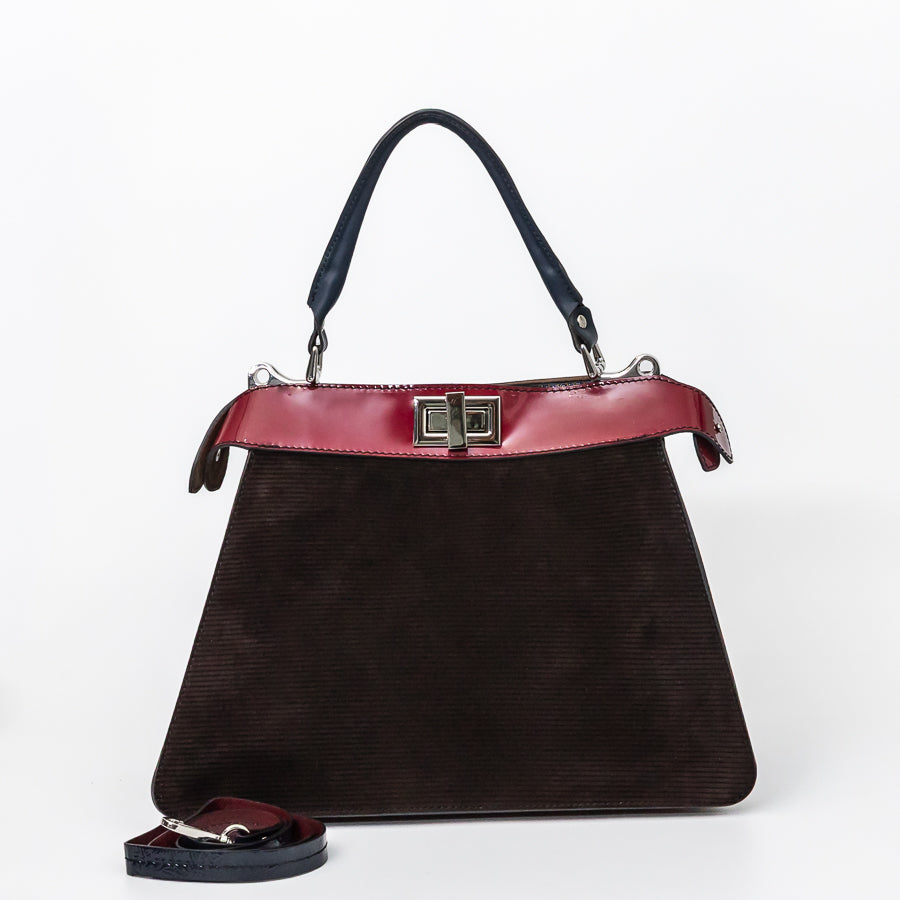 Charlotte handbag in Belissima featuring brown Italian leather with red leather accent trim and extra strap