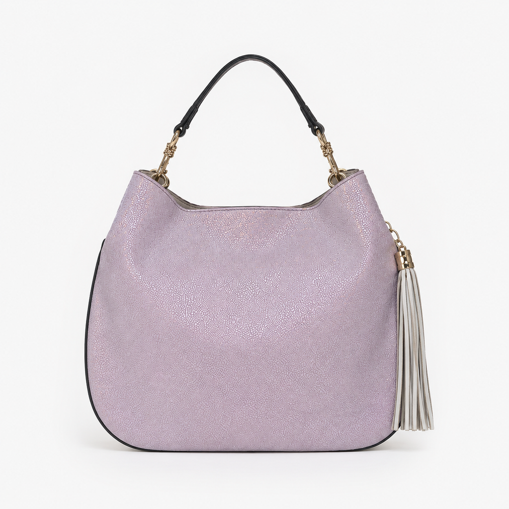 Lily handbag in Moonstone handcrafted in Italy featuring pink iridescent Italian leather and tassel detail with shoulder strap