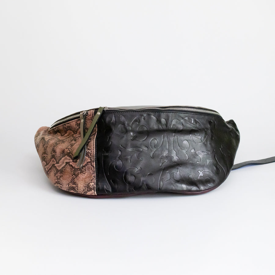 Standing image of Madeline crossbody bag in Monaco Jungle featuring snakeskin Italian leather and carved black Italian leather