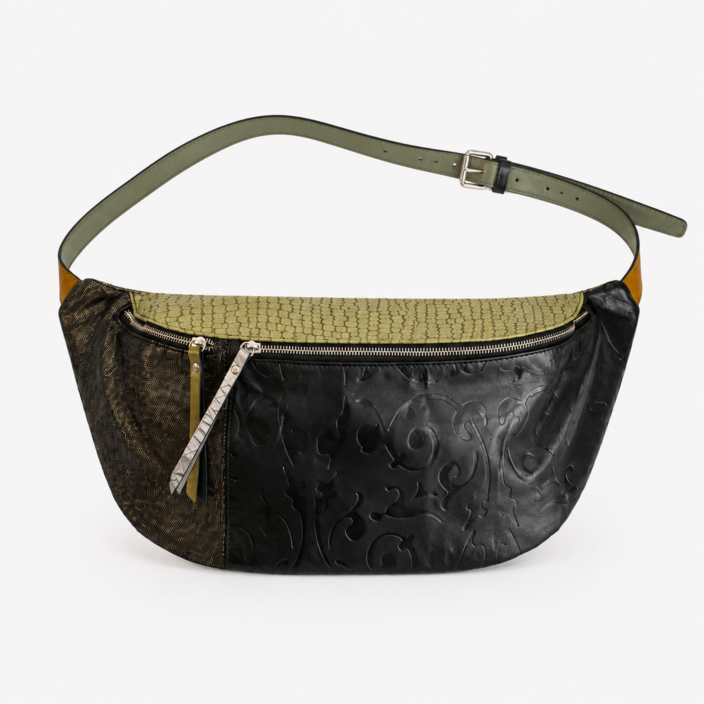 Madeline crossbody bag in Verde Notee featuring carved Italian leather and two zippered compartments