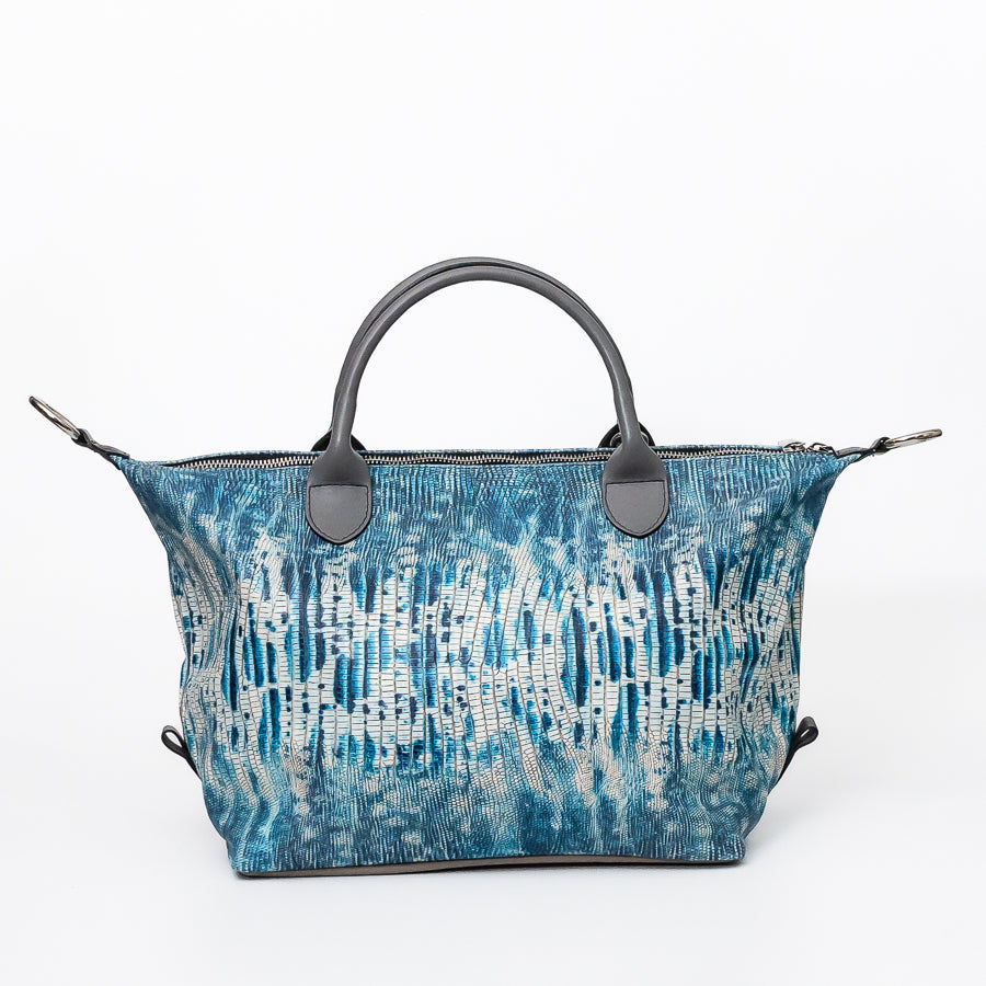 Expanded Vera handbag in Amalfi Tides featuring structured handles and textured multicolored Italian leather