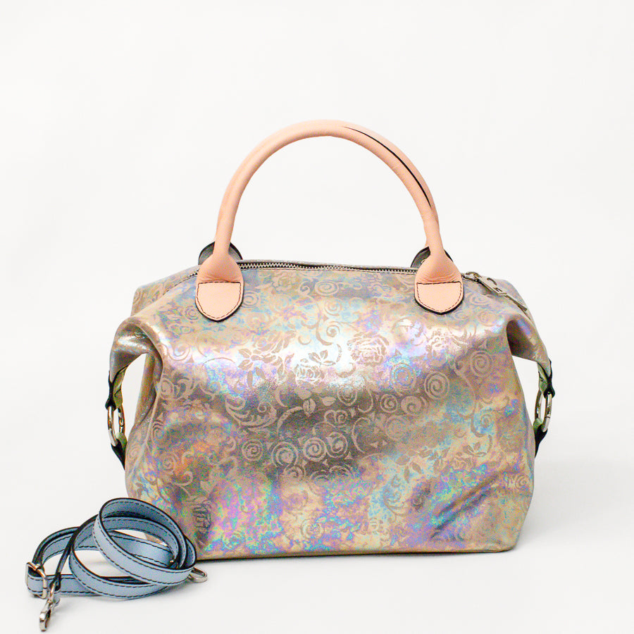 Vera handbag in Opaline Garden featuring side straps with silver o-ring clasp and structured top handles and extra strap