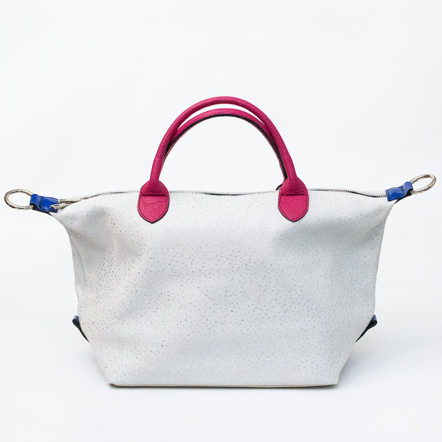 Expanded Vera handbag in Winter Orchid featuring iridescent Italian leather and pink structured top handles