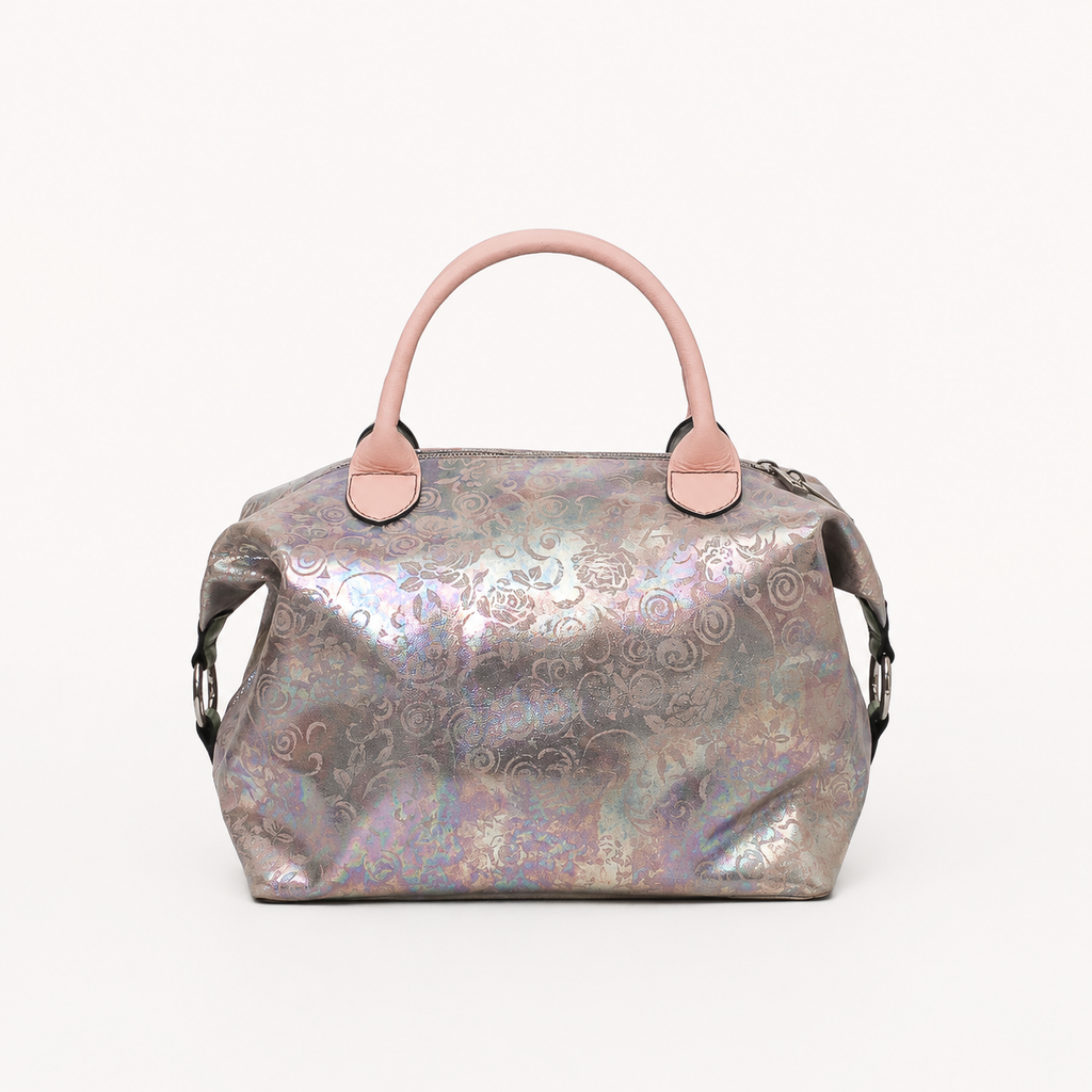 Vera handbag in Opaline Garden featuring side straps with silver o-ring clasp and structured top handles 