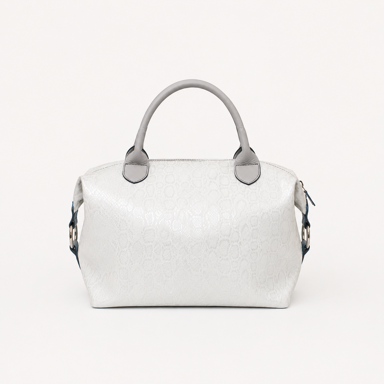 Vera handbag in Winter Lace featuring side straps with silver o-ring clasp and top silver handles 